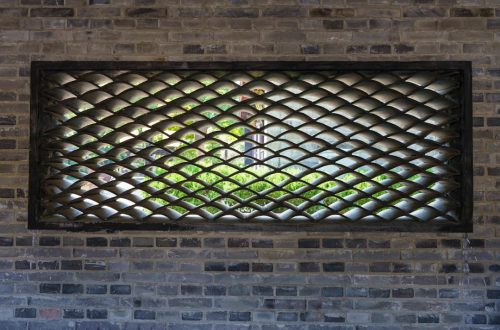 Photo brass perforated wall light
